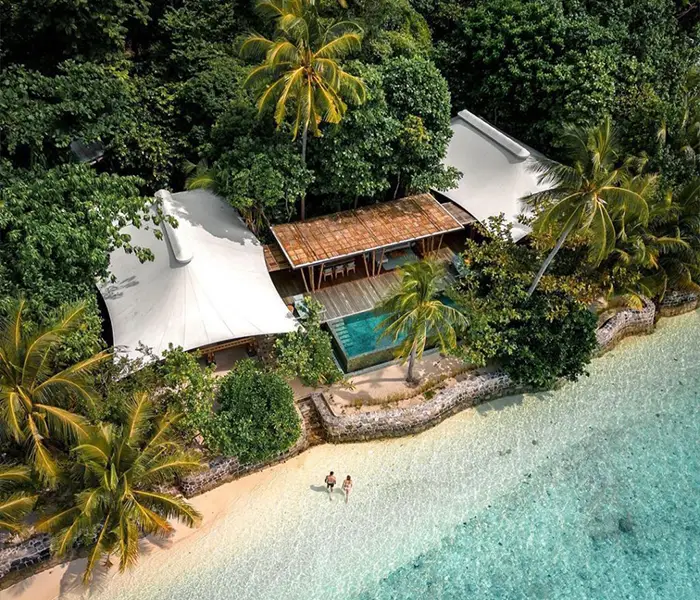 aerial-infinity-pool-villa-couple-lagoon